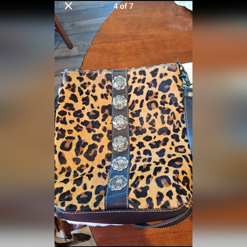 Myra COWHIDE ANIMAL PRINT FRINGED CEOSSBODY